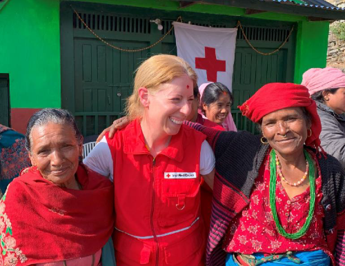 Anna Marie O’Carroll, Programme Manager for International Affairs at Irish Red Cross pictured with local women in Nepal.