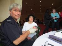 Paul Curran of Carlow fire and rescue service monitors blood pressure for Lorna Donohue of the Carlow branch.