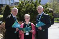Niall McGuirk, Ann McGee and Kieran Sheehan sporting green ribbons at the Civil Service Conferece in support of See Change's 