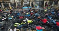 More than 100 cyclists staged a peaceful protest outside Leinster House yesterday acknowledging the loss of life on the roads