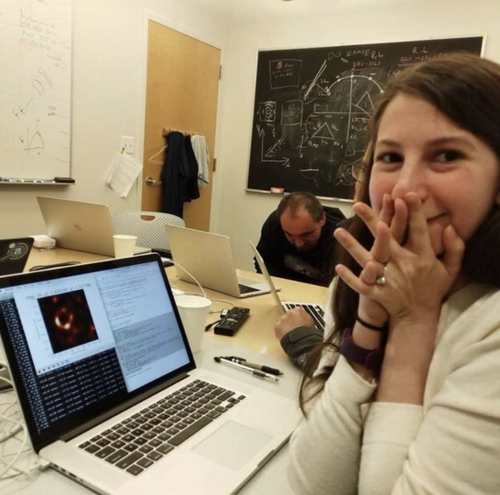 Katie Bouman, the PhD student at MIT who developed the algorithm which created the above, very first image of a black hole. Here she's just after seeing the picture herself for the first time. 