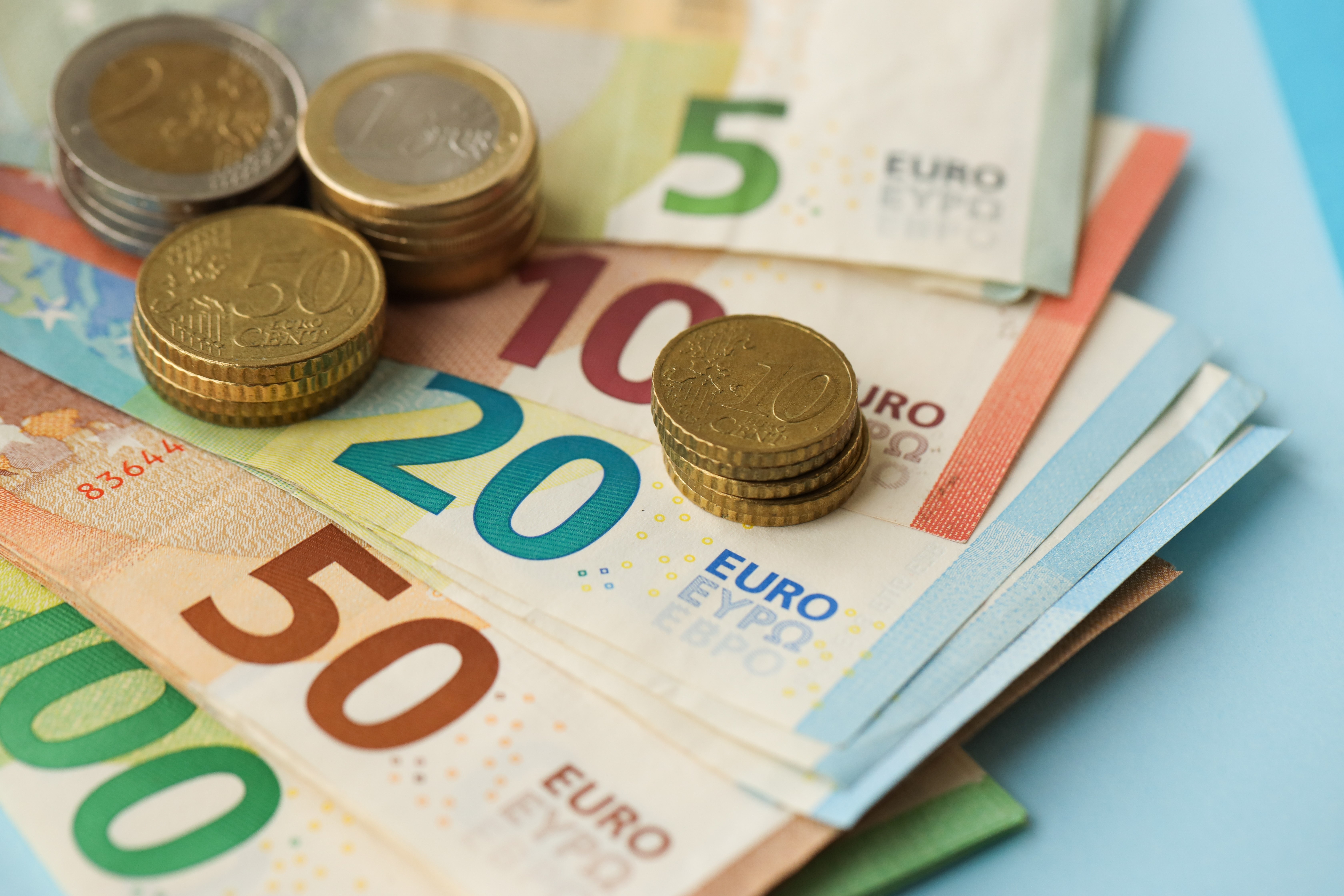 Source: Shutterstock subscription, image of euro notes and coins stack on top of each other.