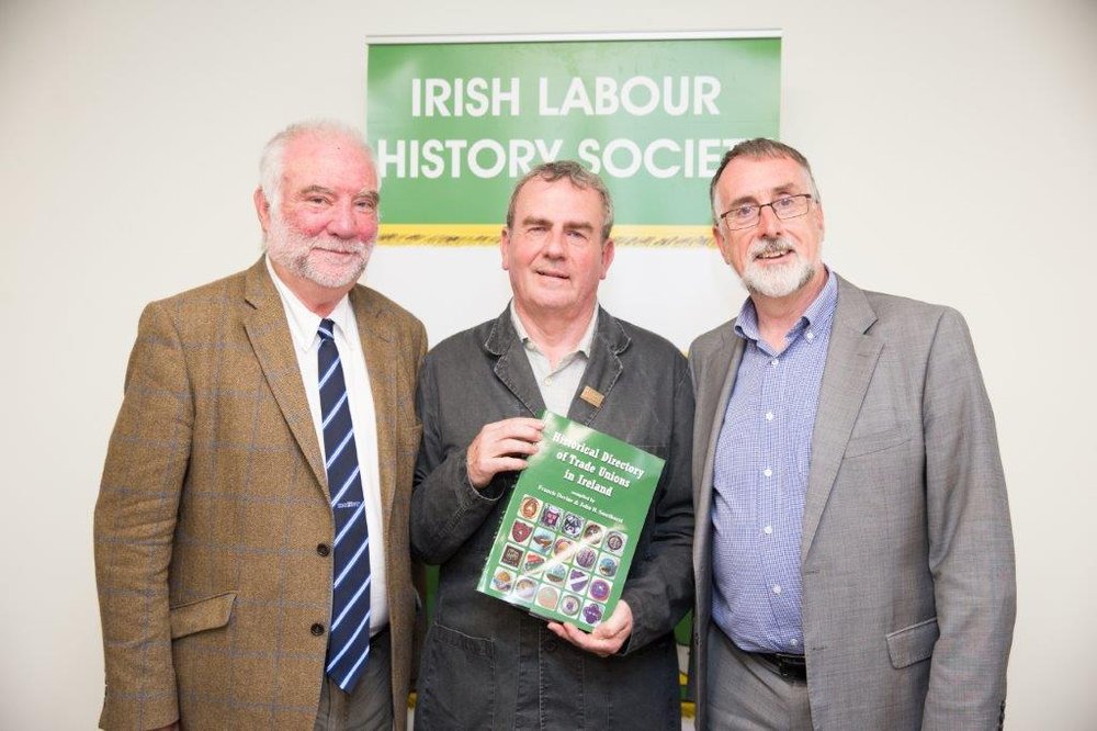 Author Frances Devine (centre) is pictured with IMPACT general secretary Shay Cody (right) and Pat Bolger, chair of the Dublin Council of Trade Unions (left).