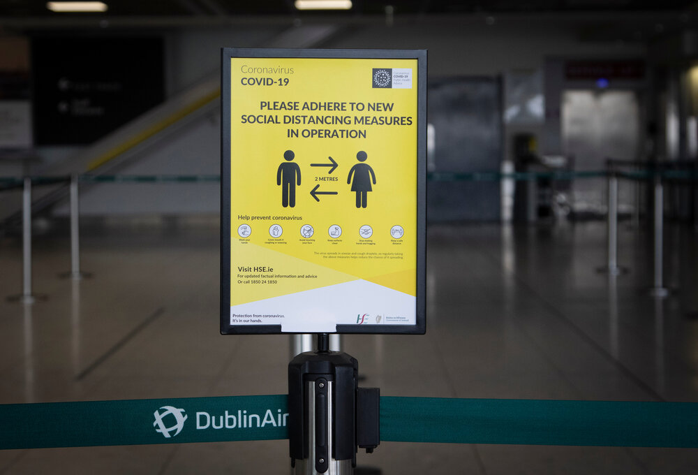Source: Shutterstock Image sign in Dublin airport warning of the need to social distance.