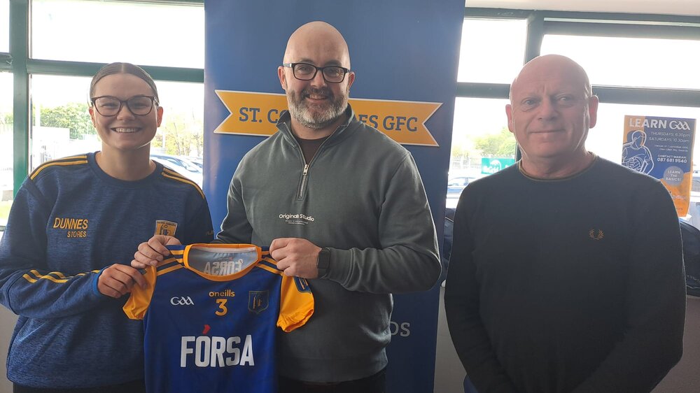 Jennifer Savage, St Colmcille's GAA, Chris Corwley (Fórsa) and Éamonn Donnelly (Deputy general secretary Fórsa)